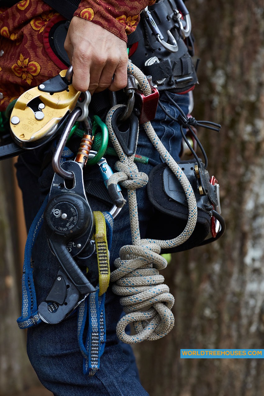 NC treehouse builders: Panthertown Adam Laufer in harness for climbing